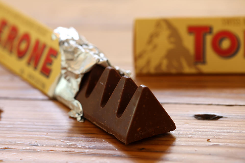 SAN ANSELMO, CALIFORNIA - MARCH 07: In this photo illustration, a Toblerone chocolate bar is displayed on March 07, 2023 in San Anselmo, California. Toblerone will drop the image of the Matterhorn Mountain from their packaging over rules in the “Swissness” legislation of 2017 that requires businesses to show how their products are sufficiently “Swiss” in order to use national symbols of Switzerland. (Photo Illustration by Justin Sullivan/Getty Images)