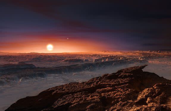 This artist’s impression shows a view of the surface of the planet Proxima b orbiting the red dwarf star Proxima Centauri.