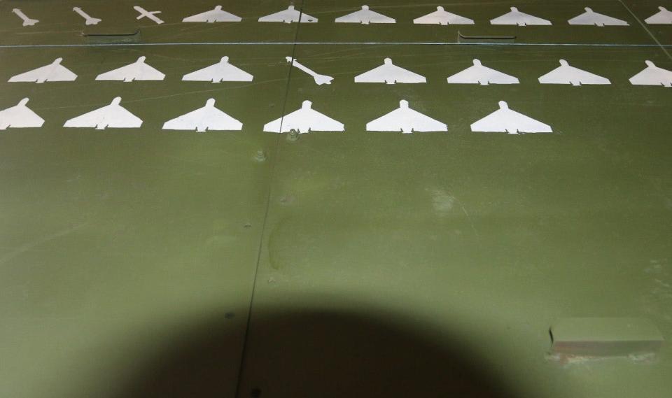 Images shaped like drones and missiles in rows.