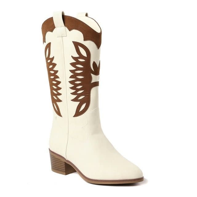 <p><a href="https://go.redirectingat.com?id=74968X1596630&url=https%3A%2F%2Fwww.walmart.com%2Fip%2FThe-Pioneer-Woman-Women-s-Eagle-Stitched-Western-Boot%2F5214229796&sref=https%3A%2F%2Fwww.goodhousekeeping.com%2Fbeauty%2Ffashion%2Fa60548368%2Fthe-pioneer-woman-accessories-walmart%2F" rel="nofollow noopener" target="_blank" data-ylk="slk:Shop Now;elm:context_link;itc:0;sec:content-canvas" class="link rapid-noclick-resp">Shop Now</a></p><p>The Pioneer Woman Eagle-Stitched Western Boots in Cognac/Wheat</p><p>$48.00</p>