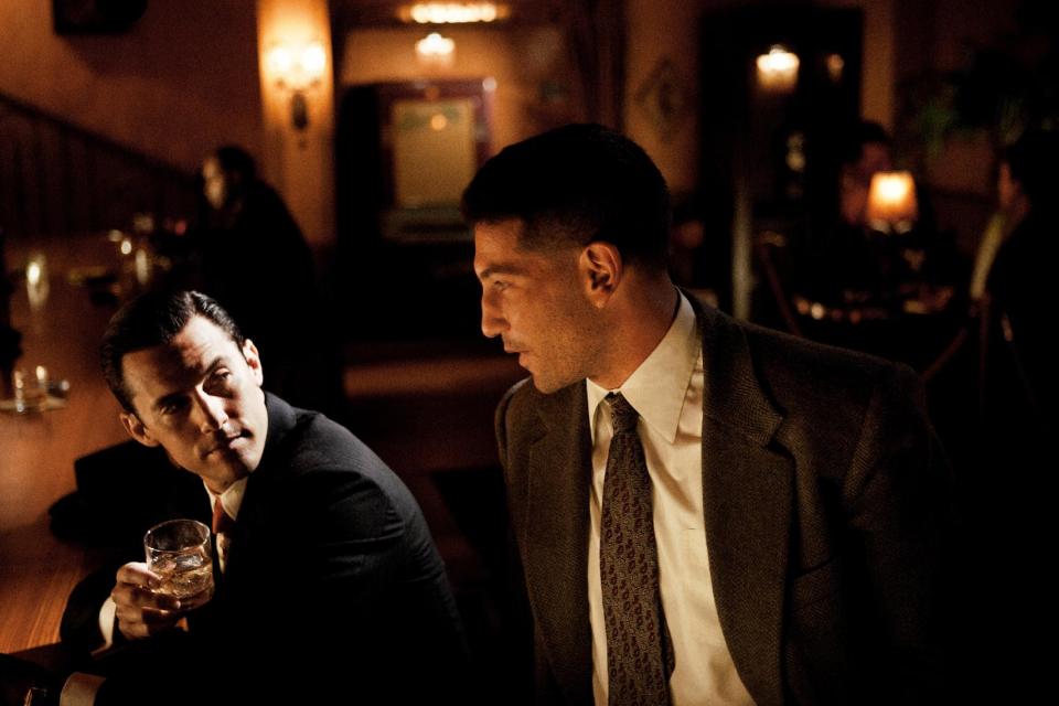 This photo provided by TNT shows Milo Ventimiglia, left, and Jon Bernthal in a scene from the TNT drama series, "Mob City." Here's a sassy, two-fisted show inspired by love: creator Frank Darabont's love for the grand film-noir tradition, which he honors impeccably in this crime drama set in 1940s L.A. (AP Photo/TNT, Scott Garfield)