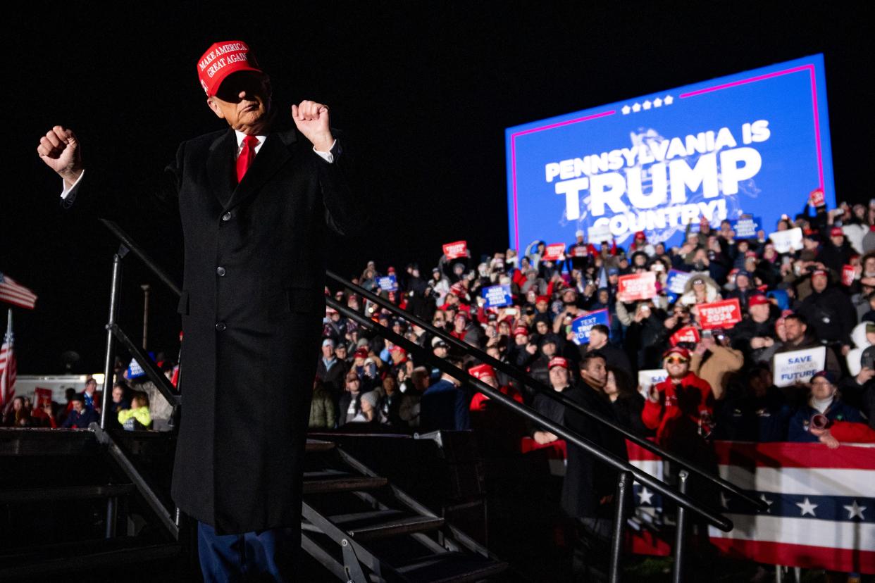 Republican presidential candidate, former President Donald Trump dances as he departs after speaking at a rally outside Schnecksville Fire Hall on April 13, 2024. Hundreds of supporters waited hours in a line stretching for more than a mile to see Trump speak in a suburb of Allentown, Pennsylvania in the Lehigh Valley.