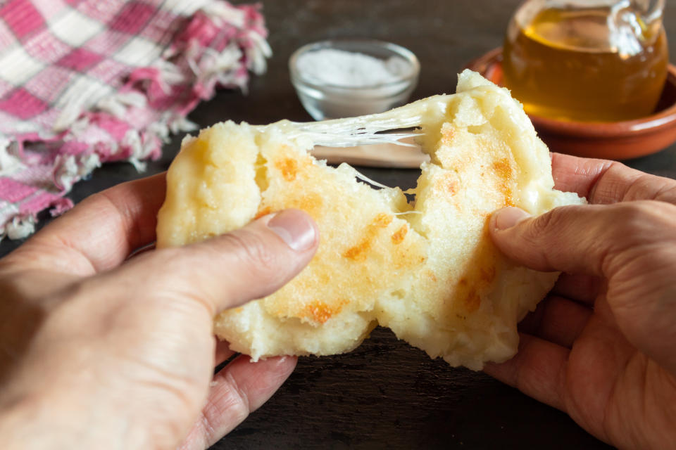 Cheese-stuffed arepas are among Espinosa's favorite things to cook. (Photo: Getty Creative)