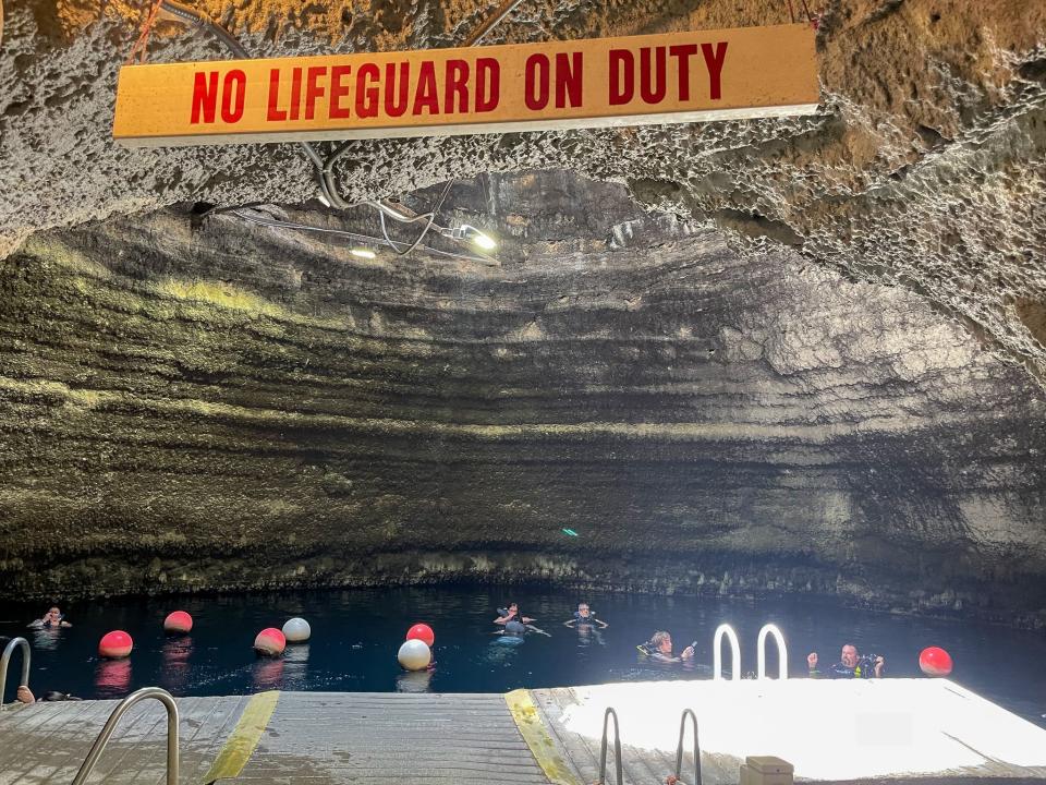 People swim, snorkel, and dive in the Homestead Crater in Midway, Utah.