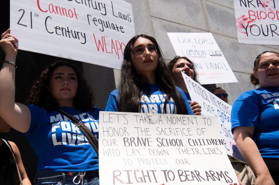 Felicia Medina, 19,  participates in the March for Our lives protest in Nashville , Tenn., Saturday, June 11, 2022. The march was part of a nation wide protest advocating for stricter gun control laws. 