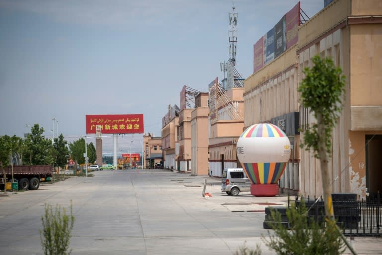 An empty street in Guangzhou New City, a 1.5 million square metre 'urban centre' on the outskirts of Kashgar in China's western Xinjiang province