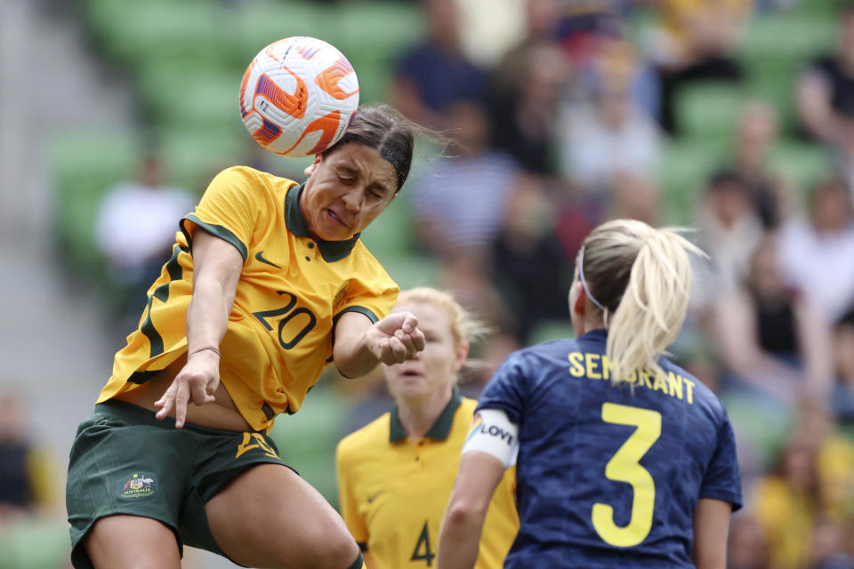 FILE - Australia's Sam Kerr, left, heads the ball over Sweden's Linda Sembrant during their women's friendly soccer match in Melbourne, Australia, Saturday, Nov. 12, 2022. (Asanka Brendon Ratnayake, File)