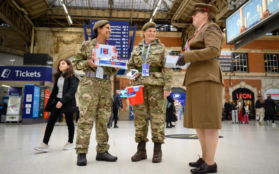 Members of the Armed Forces collect donations for the Poppy Appeal at Victoria station ahead of Remembrance Sunday - Getty Images Europe