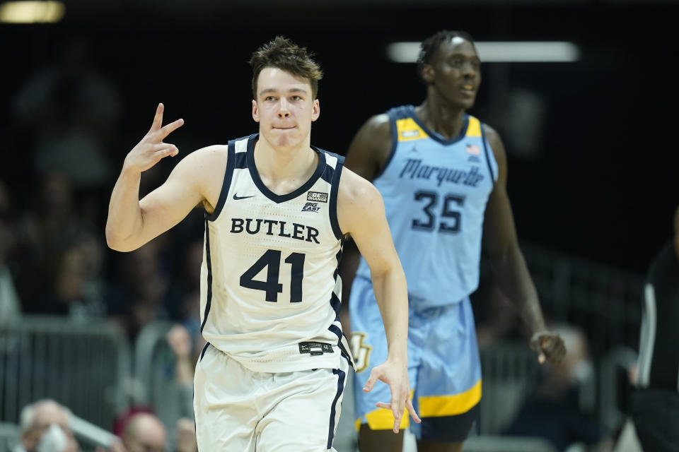 Butler's Simas Lukosius (41) reacts after hitting a basket during the second half of an NCAA college basketball game against Marquette, Saturday, Feb. 12, 2022, in Indianapolis. (AP Photo/Darron Cummings)