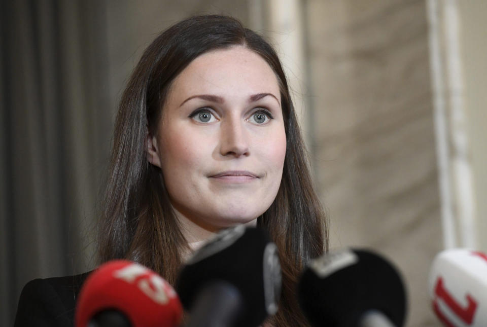 Social democrats minister Sanna Marin speaks to the media after she was elected as the new Prime Minister of Finland, in Helsinki, Finland, on Tuesday, Dec. 10, 2019. Finland’s parliament chose Sanna Marin as the country's new prime minister Tuesday, making the 34-year-old the world’s youngest sitting head of government. (Heikki Saukkomaa/Lehtikuva via AP)