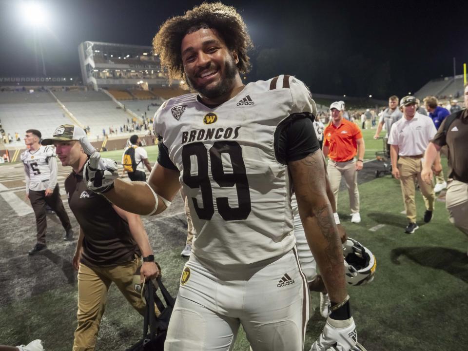 KALAMAZOO, MI - AUGUST 31: Western Michigan Broncos defensive lineman Marshawn Kneeland (99) celebrates after the college football game between the Saint Francis Red Flash  and Western Michigan Broncos on August 31, 2023, at Waldo Stadium in Kalamazoo, MI. (Photo by Joseph Weiser/Icon Sportswire via Getty Images)