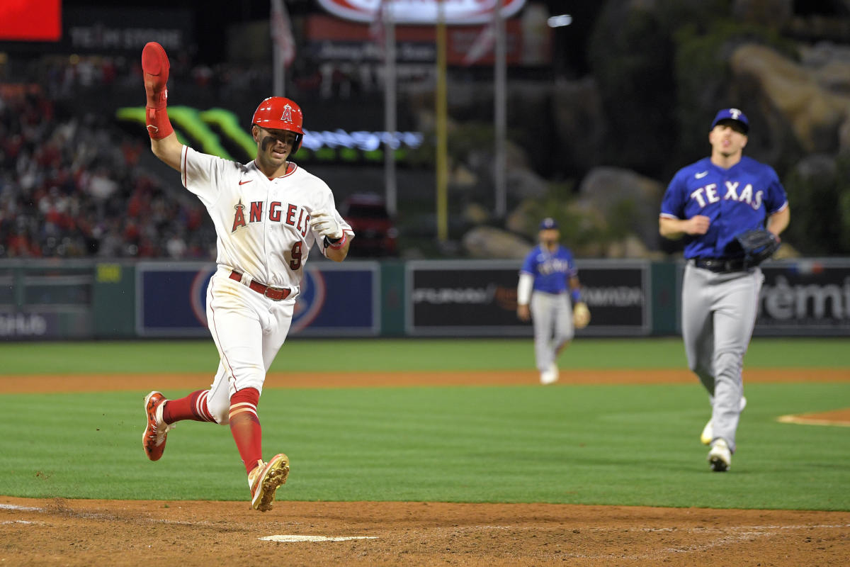 A's hit 5 home runs, rally for 11-10 win over Angels in 10