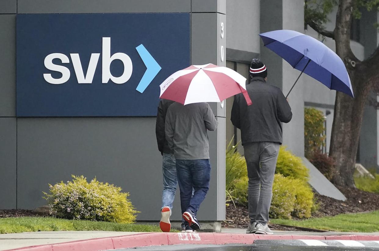 Silicon Valley Bank, the sixteenth-largest bank in the U.S., collapsed on March 10, 2023 after customers tried to collectively withdraw $42 billion in a single day. (AP Photo/Jeff Chiu)