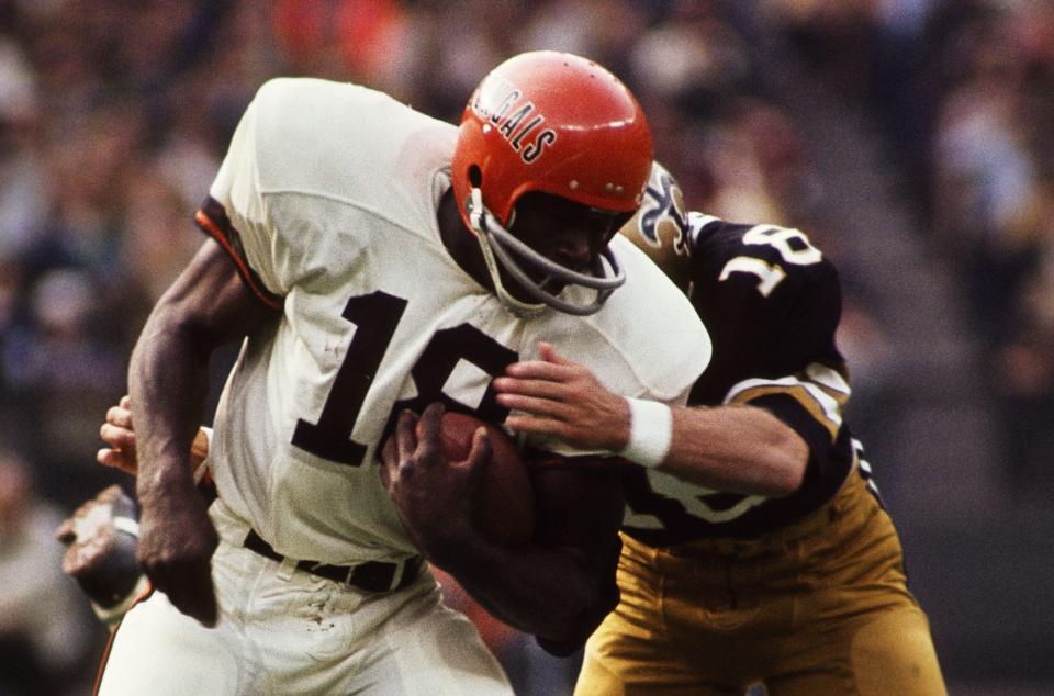 Nov 29, 1970; Cincinnati, OH, USA; FILE PHOTO; Cincinnati Bengals running back Paul Robinson (18) in action against New Orleans Saints safety Hugo Hollas (18) at Riverfront Stadium. Mandatory Credit: Malcolm Emmons-USA TODAY NETWORK