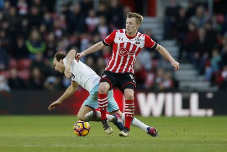 Britain Football Soccer - Southampton v West Ham United - Premier League - St Mary's Stadium - 4/2/17 Southampton's James Ward-Prowse in action with West Ham United's Mark Noble Action Images via Reuters / Matthew Childs Livepic