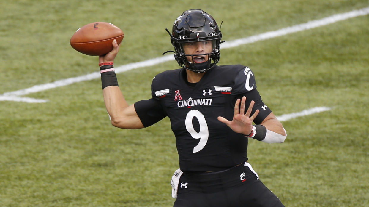 Cincinnati quarterback Desmond Ridder plays against Army during an NCAA college football game Saturday, Sept. 26, 2020, in Cincinnati, Ohio. (AP Photo/Jay LaPrete)