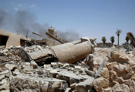 The remains of al-Hadba minaret at the Grand al-Nuri Mosque are pictured in the Old City in Mosul, Iraq July 2, 2017. REUTERS/Erik De Castro