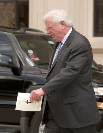 FILE PHOTO: Former Texas Governor Mark White leaves memorial services for Enron founder Ken Lay at the First United Methodist Church in Houston July 12, 2006. REUTERS/Richard Carson/File Photo