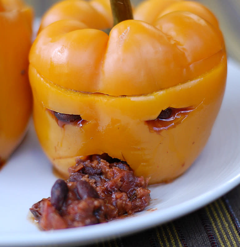 <p>Healthy Slow Cooking</p><p>A monstrously good meatless meal.</p><p><strong>Get the recipe: <a href="http://healthyslowcooking.com/super-scary-spicy-chili-stuffed-jack-o-peppers/" rel="nofollow noopener" target="_blank" data-ylk="slk:Scary Spicy Chili Stuffed Jack-O-Peppers;elm:context_link;itc:0;sec:content-canvas" class="link rapid-noclick-resp">Scary Spicy Chili Stuffed Jack-O-Peppers</a></strong></p><p><strong>Related: <a href="https://parade.com/1066846/jessicasager/halloween-trivia/" rel="nofollow noopener" target="_blank" data-ylk="slk:Halloween Trivia;elm:context_link;itc:0;sec:content-canvas" class="link rapid-noclick-resp">Halloween Trivia</a></strong></p>