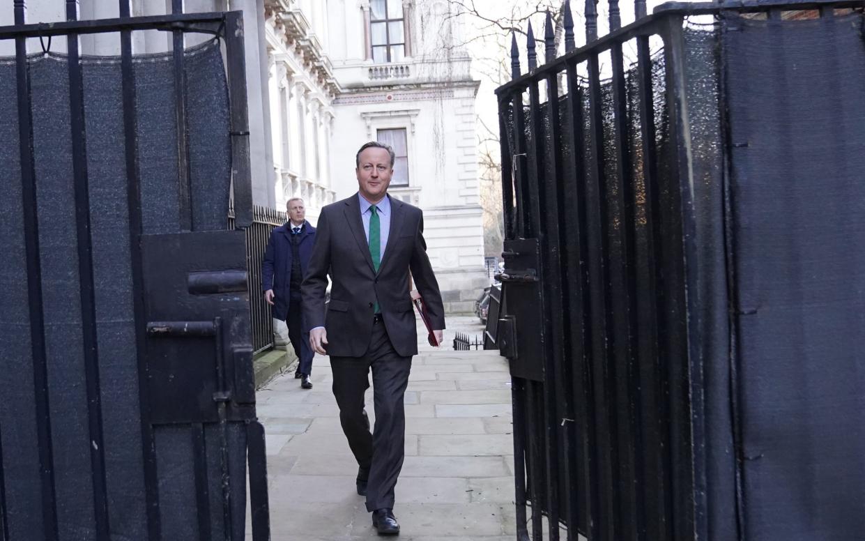 Lord Cameron the Foreign Secretary, arrives in Downing Street, London, for a Cabinet meeting