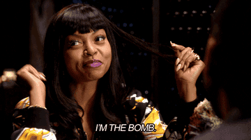 Taraji P Henson, smiling, points to herself and says, "I'M THE BOMB"