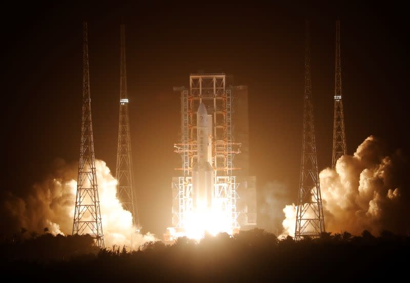 The Long March-5 Y5 rocket, carrying the Chang'e-5 lunar probe, takes off from Wenchang Space Launch Center, in Wenchang