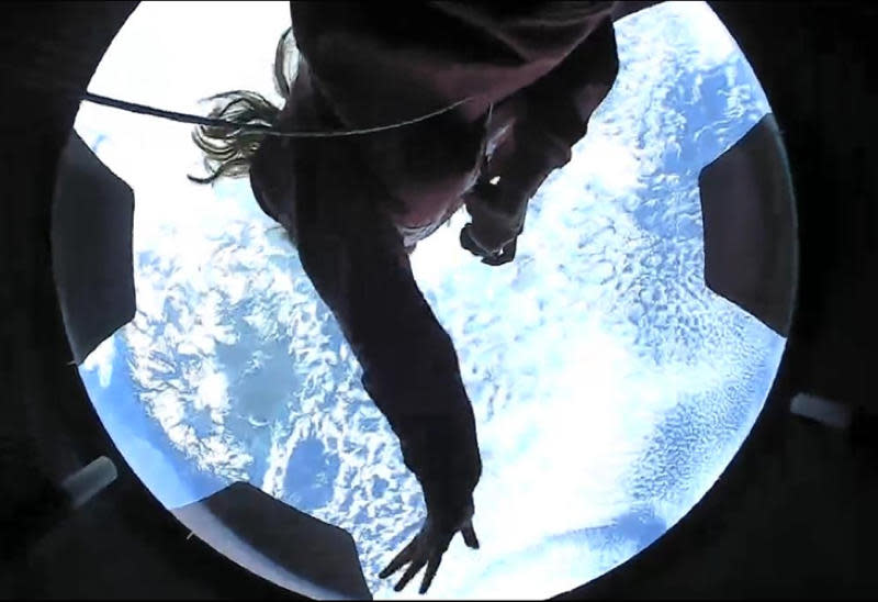 Arceneaux shows St. Jude patients the view through the Crew Dragon's cupola dome window. / Credit: SpaceX