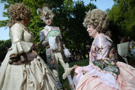 <p>Visitors in outfits inspired by 17th-century European royal courts attend the Victorian picnic on the first day of the annual Wave-Gotik-Treffen (WGT) Goth music festival on June 2, 2017 in Leipzig, Germany. (Sean Gallup/Getty Images) </p>