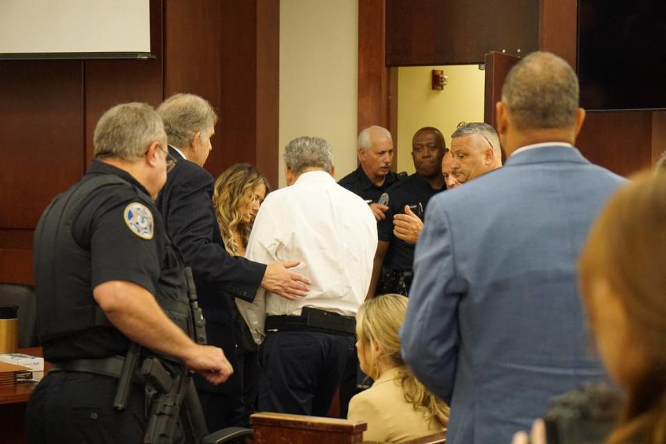 Greg Leon is led from the Lexington County Courtroom after being found guilty of murdering his wife’s lover Arturo Bravo Santos on July 6, 2023.