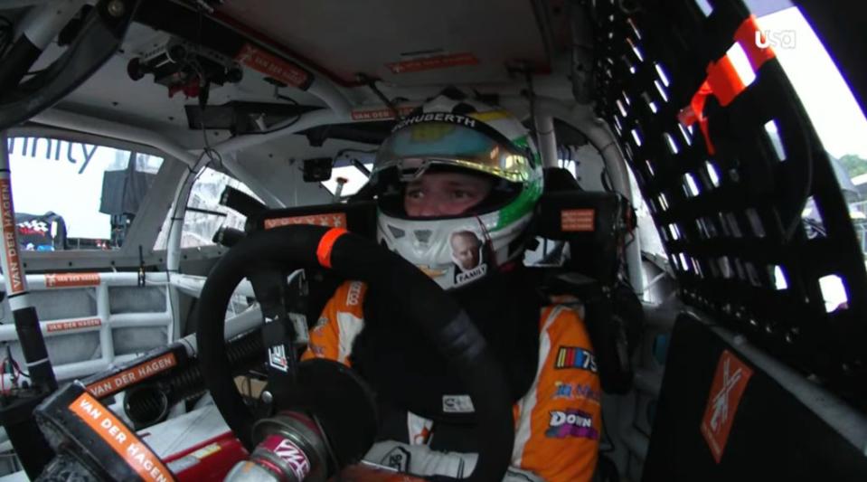 Brennan Poole waits inside his car during a rain hold at Chicago street course (USA Network)