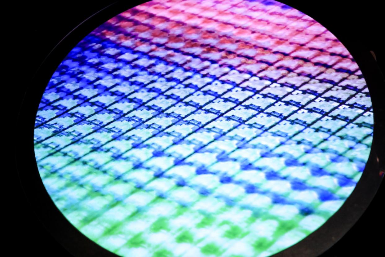 An image of a semiconductor wafer at the Taiwan Semiconductor Manufacturing Co. (TSMC) Museum of Innovation in Hsinchu, on Tuesday, Jan. 11, 2022. Photographer: I-Hwa Cheng/Bloomberg