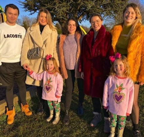 Sarah Beth Grey, second right, with siblings Cliff, 23, Emily, 30, second left, Amy, 29, centre, Chloe, 32, right, and their nieces Fleur and Felicity (Family handout/PA)