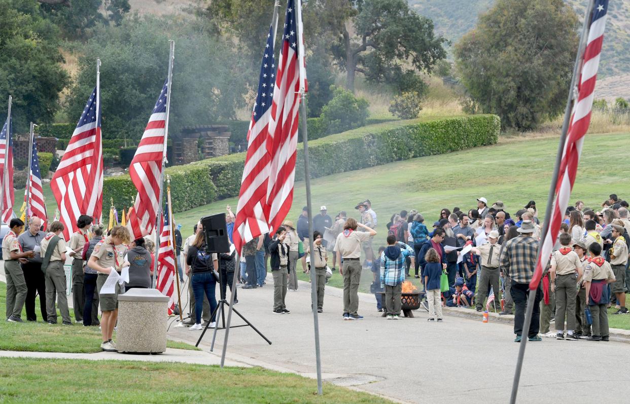 Scouts salute flags as they retire them by burning at Pierce Brothers Valley Oaks-Griffin Memorial Park in Westlake Village in May. Choosing a quality, durable flag reduces time and resources needed for proper retirement.