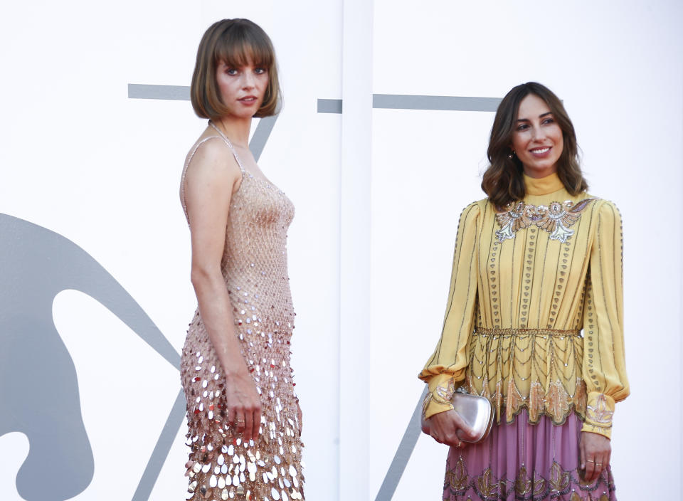 Actress Maya Hawke, left, and director Gia Coppola pose for photographers upon arrival at the premiere for the film 'Mainstream' during the 77th edition of the Venice Film Festival in Venice, Italy, Saturday, Sept. 5, 2020. (Photo by Joel C Ryan/Invision/AP)