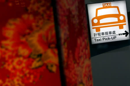 A taxi sign is seen in Taipei, Taiwan January 26, 2017. Picture taken January 26, 2017. REUTERS/Tyrone Siu