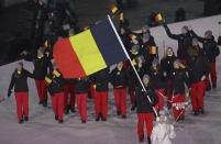 <p>Seppe Smits carries the flag of Belgium during the opening ceremony of the 2018 Winter Olympics in Pyeongchang, South Korea, Friday, Feb. 9, 2018. (AP Photo/Michael Sohn) </p>