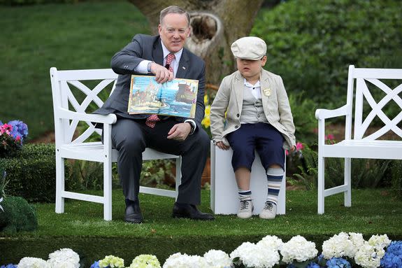 WASHINGTON, DC - APRIL 17:  White House Press Secretary Sean Spicer reads the childrens' book 'How To Catch The Easter Bunny' during the 139th Easter Egg Roll on the South Lawn of the White House April 17, 2017 in Washington, DC. The White House said 21,000 people are expected to attend the annual tradition of rolling colored eggs down the White House lawn that was started by President Rutherford B. Hayes in 1878.  (Photo by Chip Somodevilla/Getty Images)