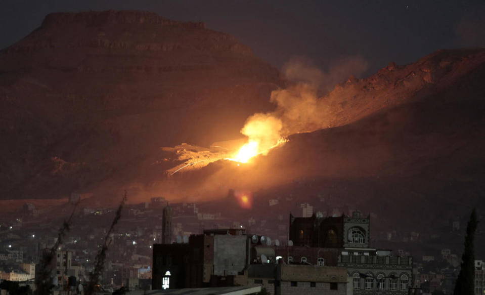 <p>Fire and smoke rise after a Saudi-led airstrike hit a site believed to be one of the largest weapons depots on the outskirts of Yemen’s capital, Sanaa, Oct. 14, 2016. (Photo: Hani Mohammed/AP)</p>