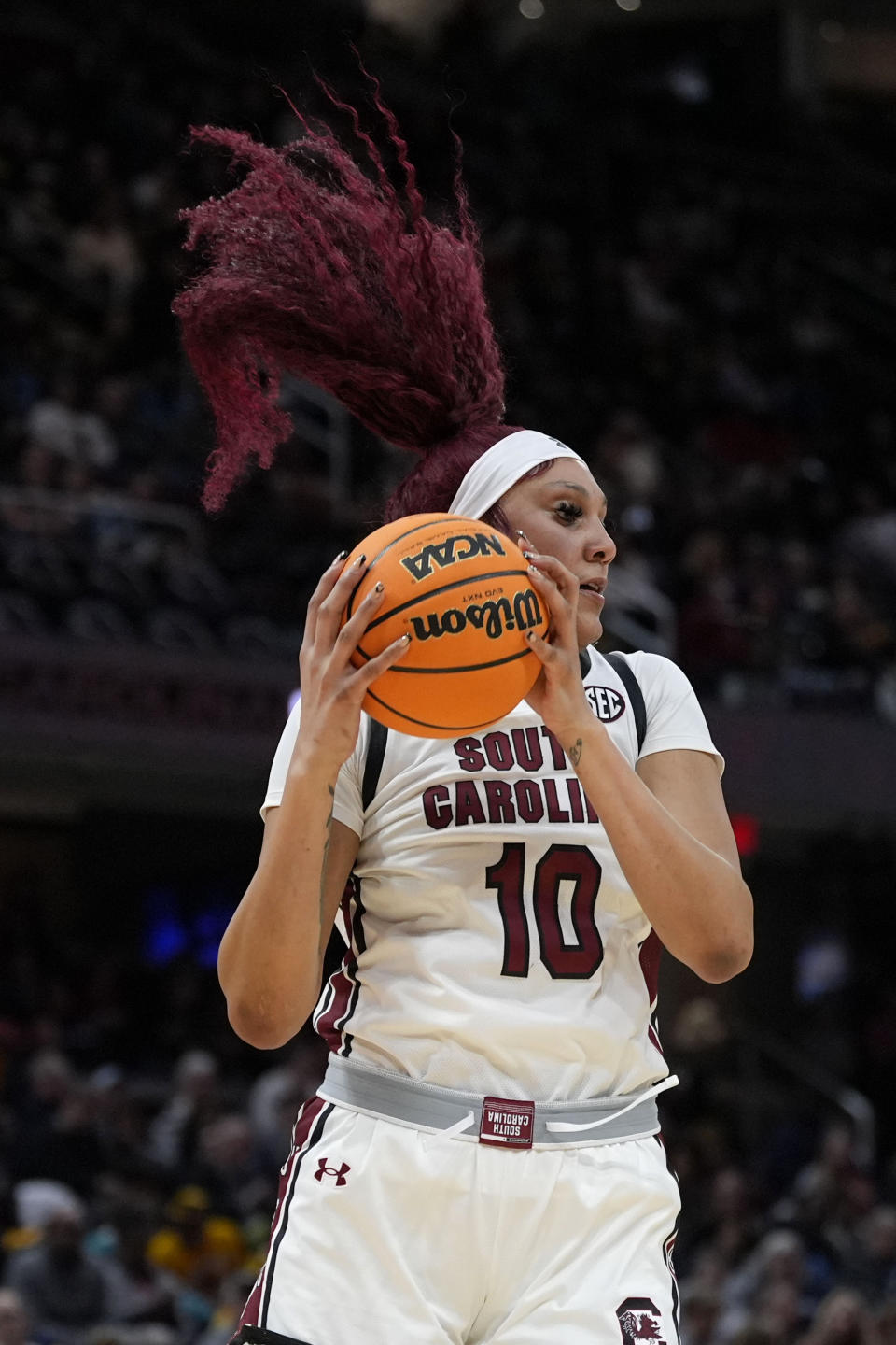 South Carolina center Kamilla Cardoso grabs a rebound during the second half of a Final Four college basketball game against North Carolina State in the women's NCAA Tournament, Friday, April 5, 2024, in Cleveland. (AP Photo/Morry Gash)