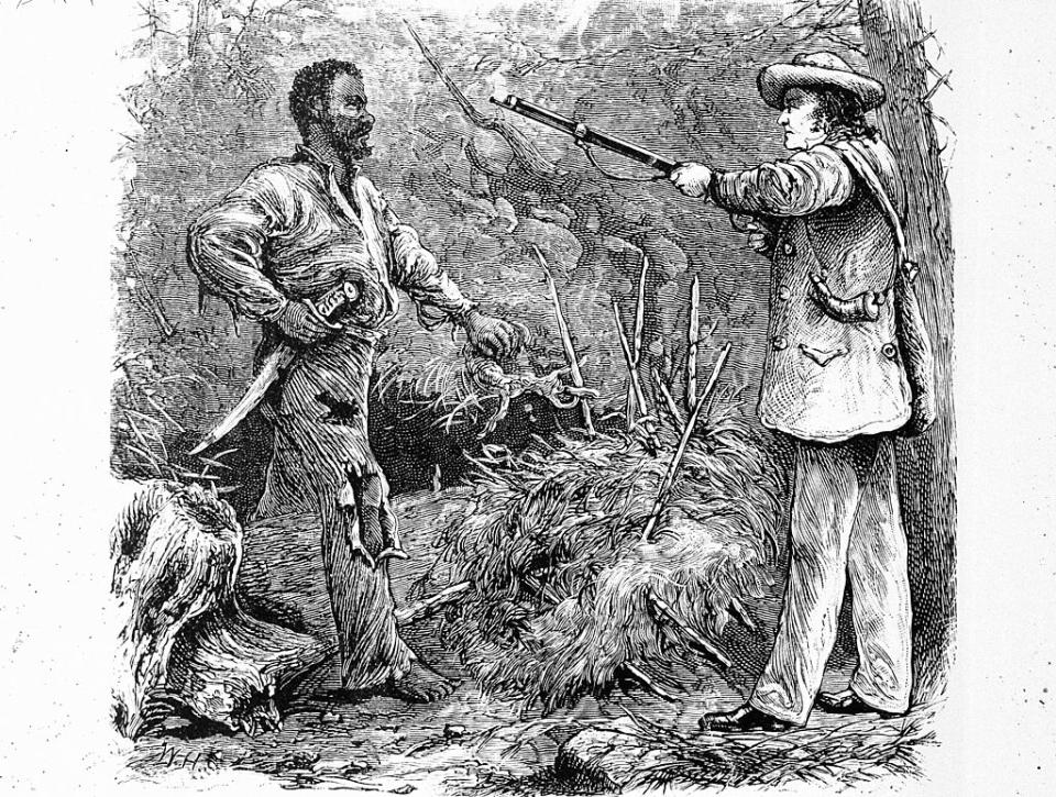 A circa 1831 illustration of the discovery of Nat Turner, who led an uprising of enslaved people in August 1831.<span class="copyright">MPI—Getty Images</span>