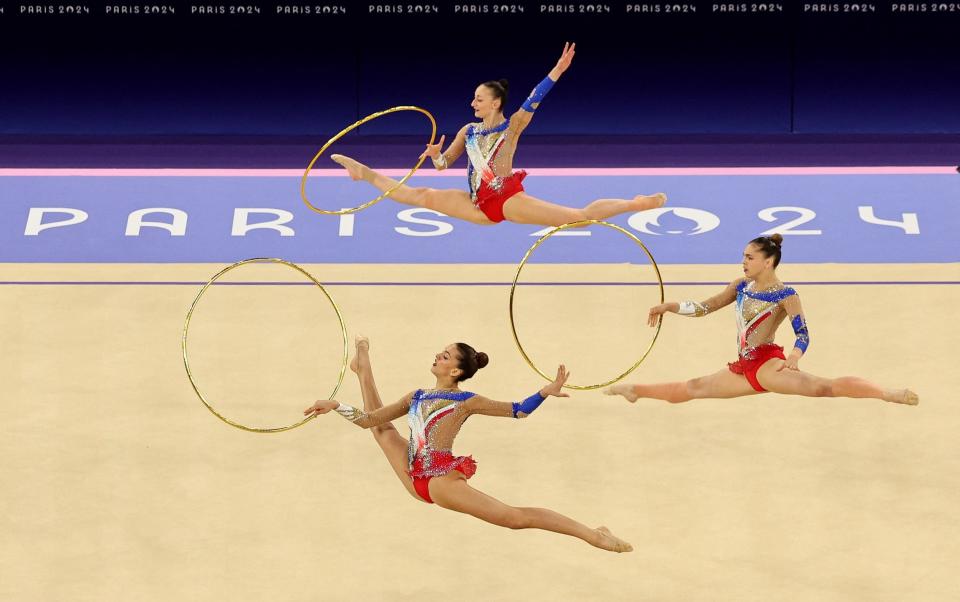 The French rhythmic gymnastics team perform in the group all-around final