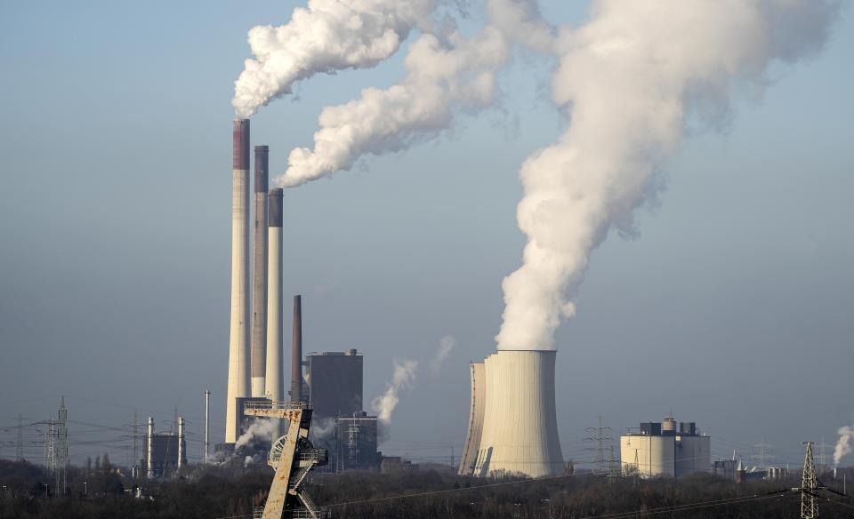FILE - The Scholven coal fired power station, owned by uniper, steams in Gelsenkirchen, Germany, Monday, Jan. 10, 2022. (AP Photo/Martin Meissner, File)