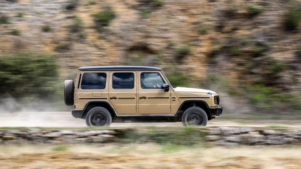 Driving the all-electric Mercedes-Benz G 580, shown here in the color Desert Sand.