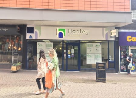 Women pass by the Hanley Economic Building Society branch in Stoke-on-Trent