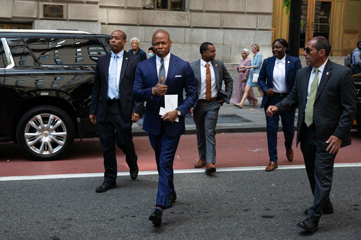 New York City Mayor Eric Adams arriving at a presser surrounded by his security detail in Manhattan, Tuesday, Aug. 23, 2022.