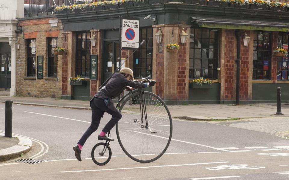 Passersby looked on with interest as he then remounted in the controversial cycle lane, C9 - Peter Hogan 