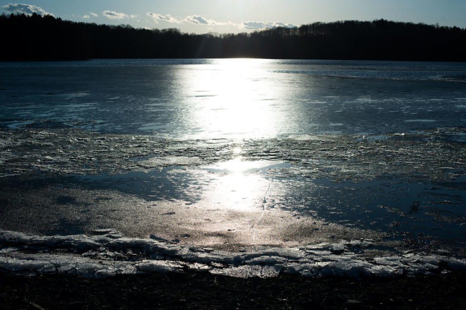 The sun shines across the water of the Lake Washington reservoir in Newburgh, New York. (Photo: Mark Kauzlarich for HuffPost)