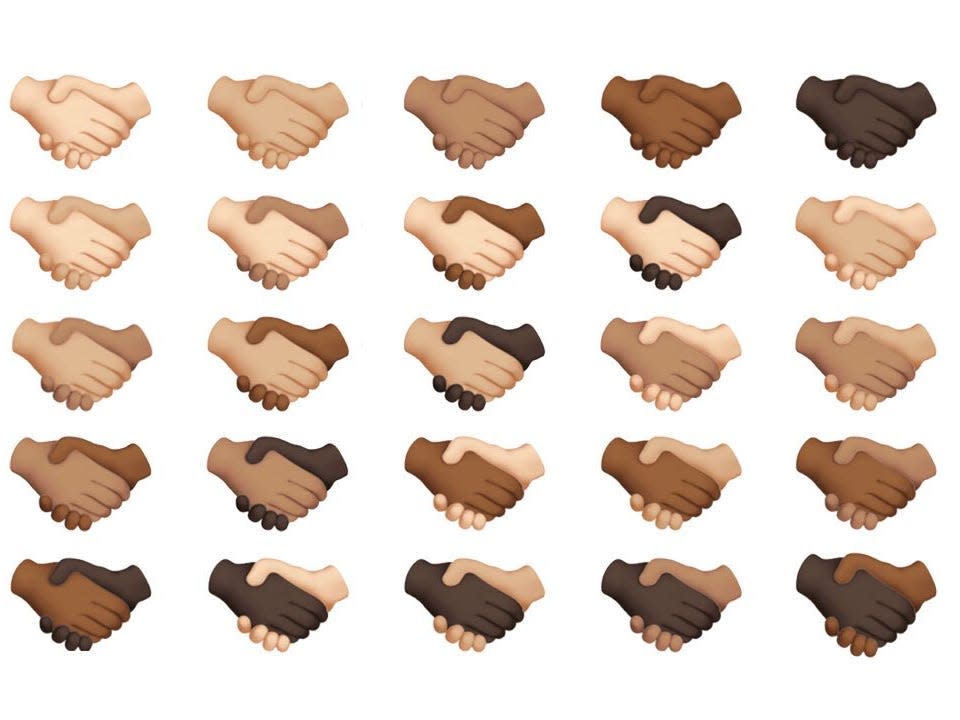 emoji of handshakes in a range of different skin tones