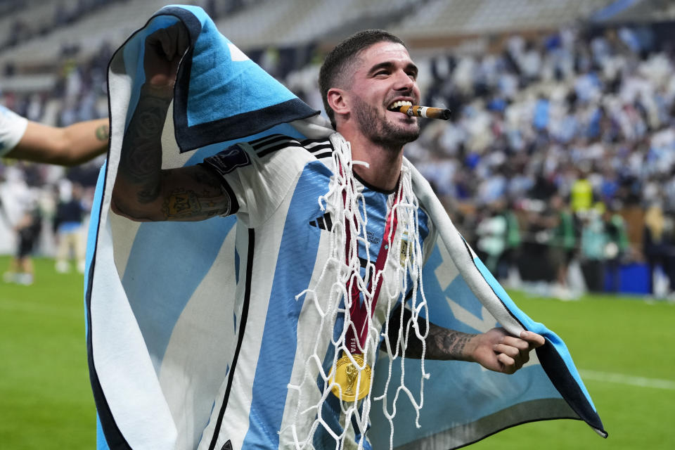 Argentina's Rodrigo De Paul celebrates winning the World Cup final soccer match between Argentina and France at the Lusail Stadium in Lusail, Qatar, Sunday, Dec.18, 2022. (AP Photo/Manu Fernandez)