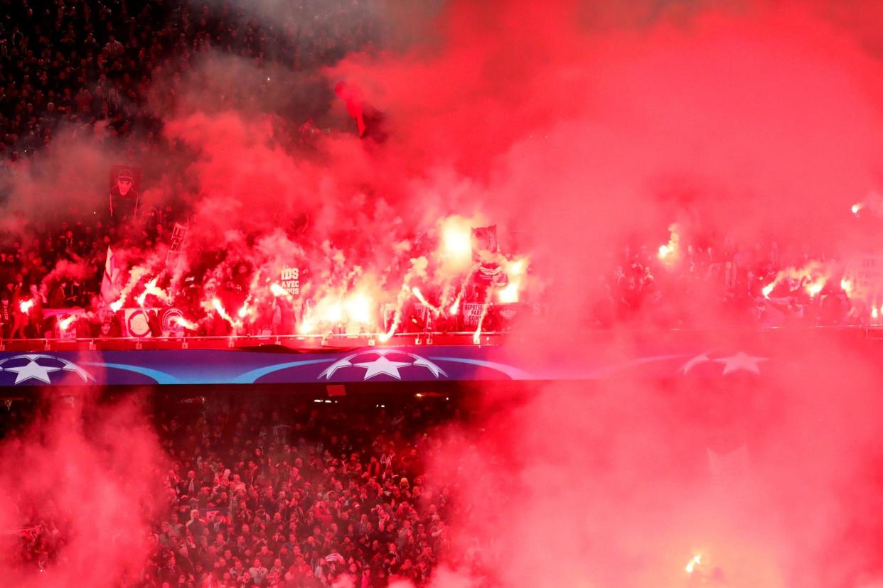 PSG's match vs Real Madrid saw fans letting off flares at the Parc des Princes: REUTERS